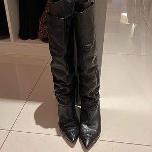Stunning Chanel knee-high leather boots.